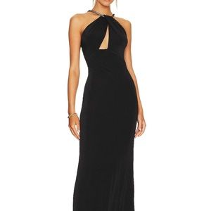 Black dress with silver neck halter. Worn once, dry cleaned. No stains/rips.